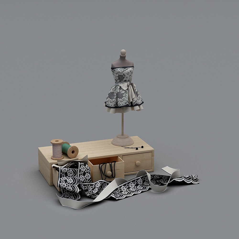 Wooden sewing box with lace dress on mannequin and spools on grey background