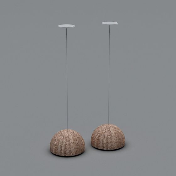 Two modern pendant lights with woven wood domes on grey background