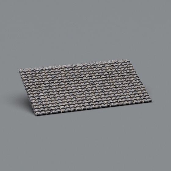 Traditional grey clay roof tiles with curved shape and rough texture on grey background