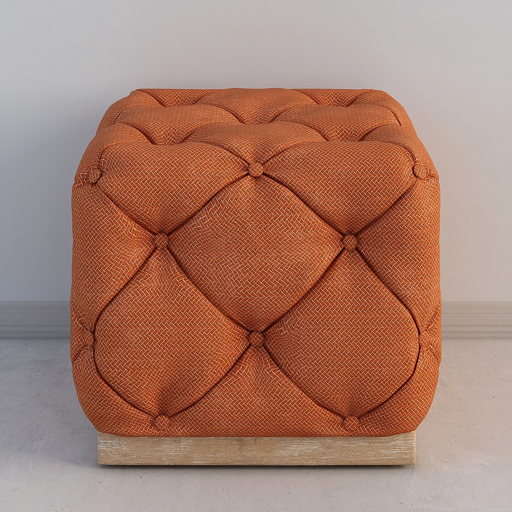 Orange fabric tufted ottoman with wooden base on grey background