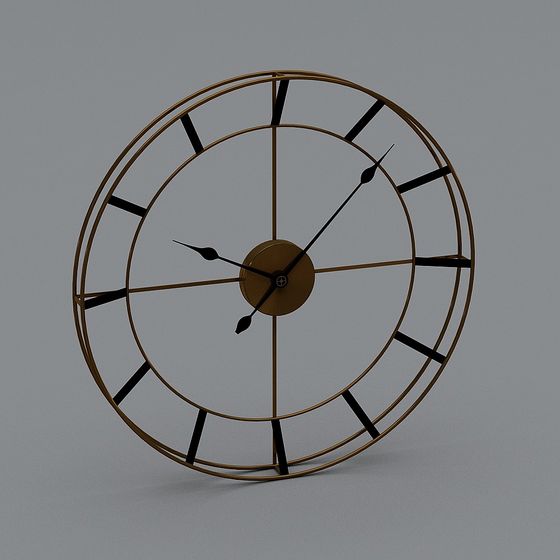 Modern gold metal wall clock with black hands and markers on grey background