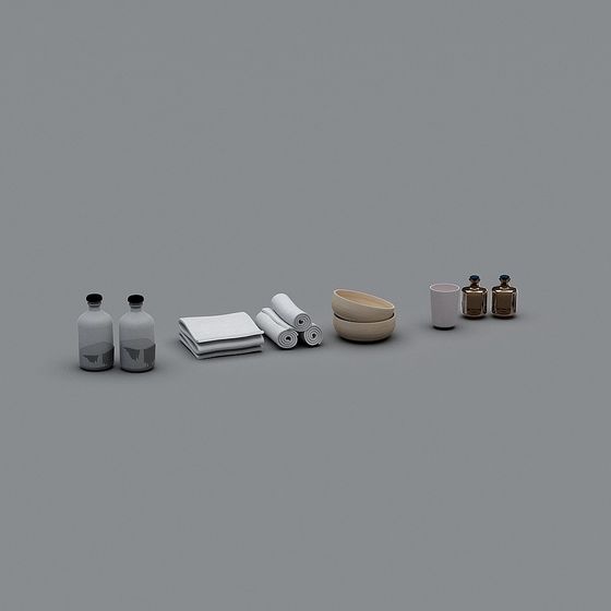 Set of bathroom accessories including bottles towels bowls and cups on grey background