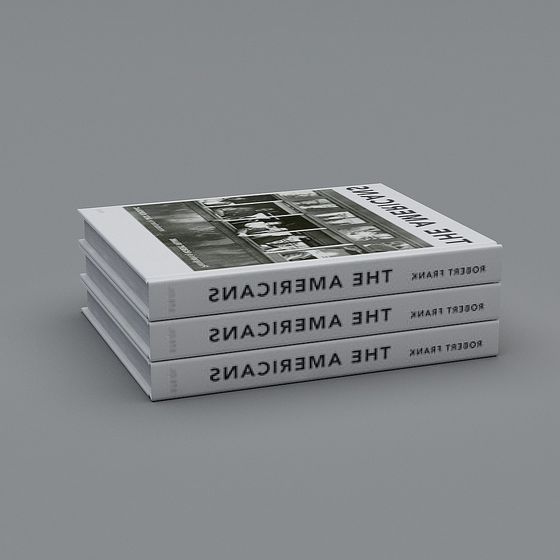 Three stacked white hardcover books with black text and photos on grey background