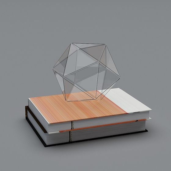 Clear geometric glass shape on two stacked books with orange wood cover on grey background