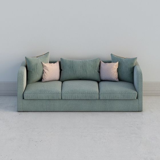 Modern green fabric sofa with pink pillows and textured surface on white background