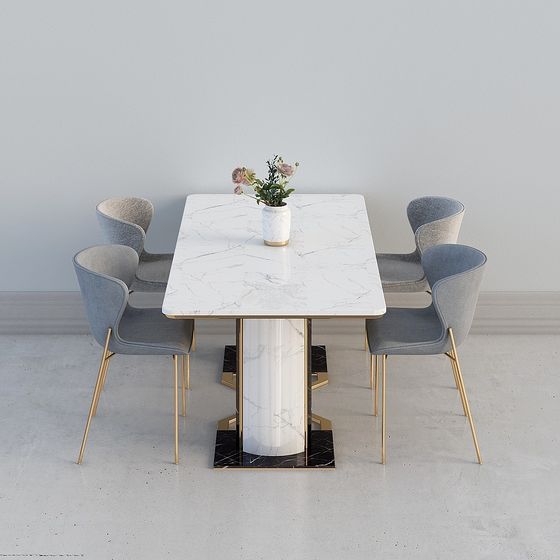 Modern white marble dining table with gold legs and four grey chairs on light grey background