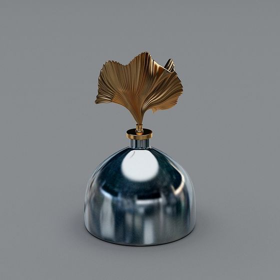 Decorative silver glass bottle with gold leaf top on grey background