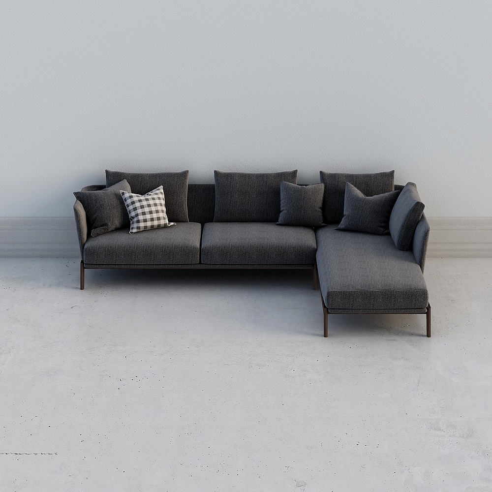 Modern dark grey fabric sectional sofa with checkered pillow and metal legs on light grey background