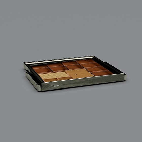 Modern silver metal drawer organizer with brown leather dividers on grey background