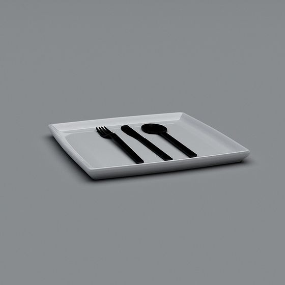 Modern white square ceramic plate with black fork knife spoon on grey background