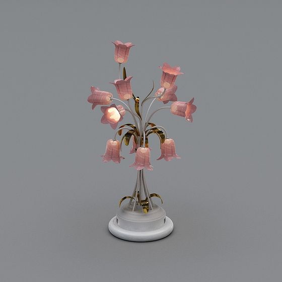 Table light fixture with pink flower shades and gold leaves on grey background