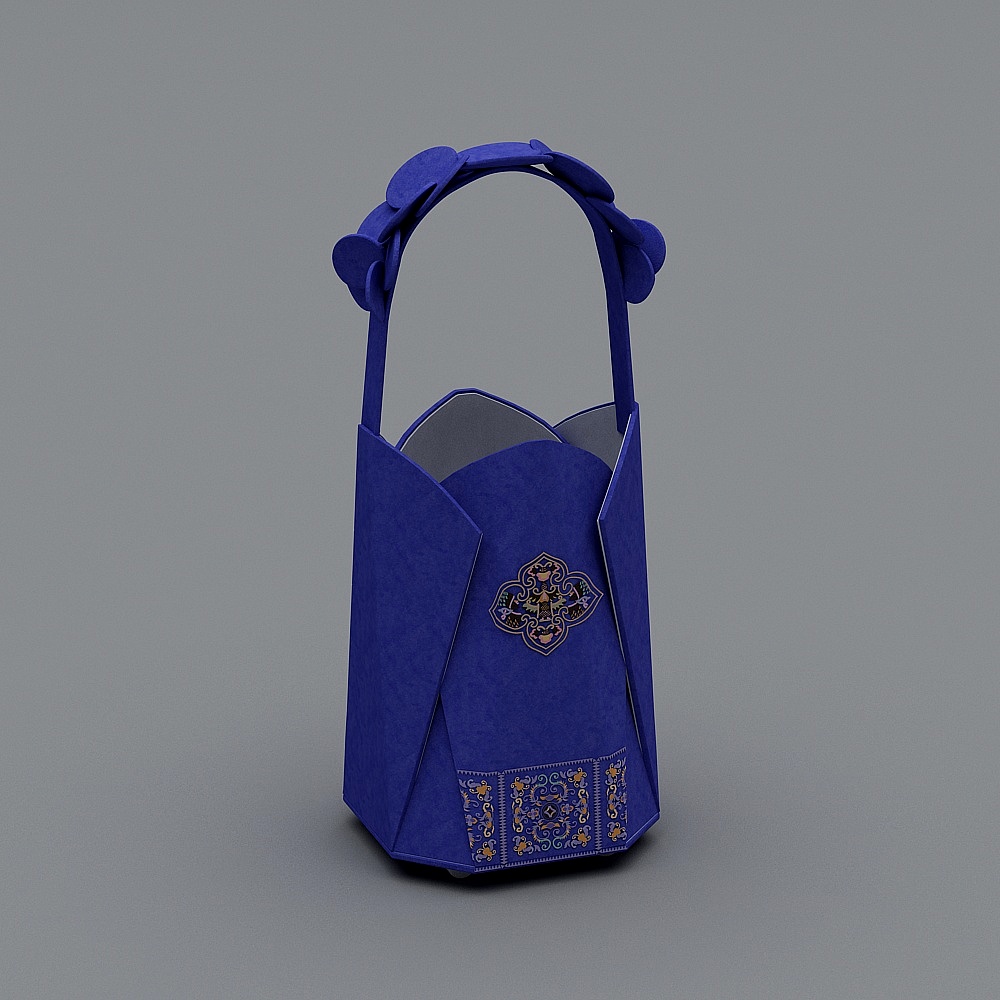 Blue paper gift bag with gold patterns and handle on grey background