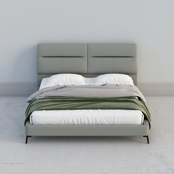 Modern light grey upholstered bed with white bedding and green throw blanket on grey background