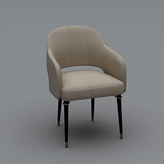 Modern beige fabric armchair with black legs and gold feet on grey background