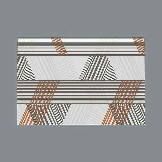 Modern geometric rug with grey orange white striped triangle pattern on grey background