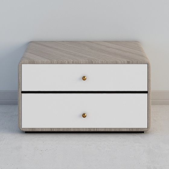 Modern light wood cabinet with two white drawers and gold knobs on grey background