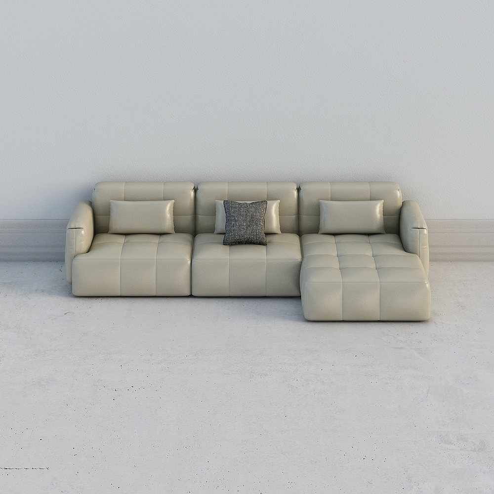 Modern beige leather sectional sofa with tufted seats and grey pillow on white background