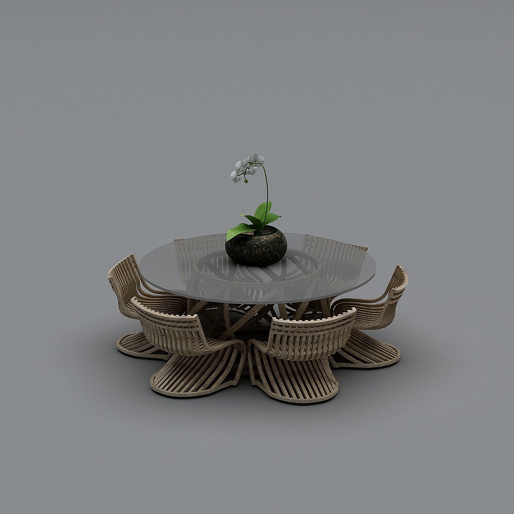 Modern round glass dining table with four wooden chairs and white flower on grey background