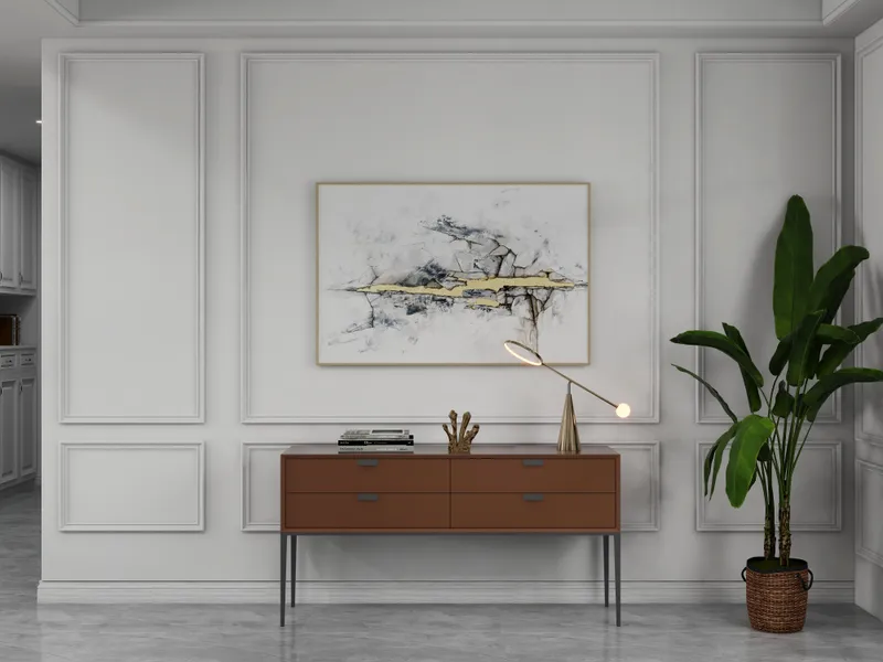 Modern white wall with panels, brown cabinet, abstract painting, gold desk lamp, and green plant