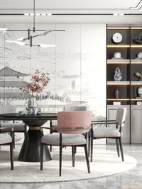 Close up of pink and grey dining chairs around a black table with lit cabinets
