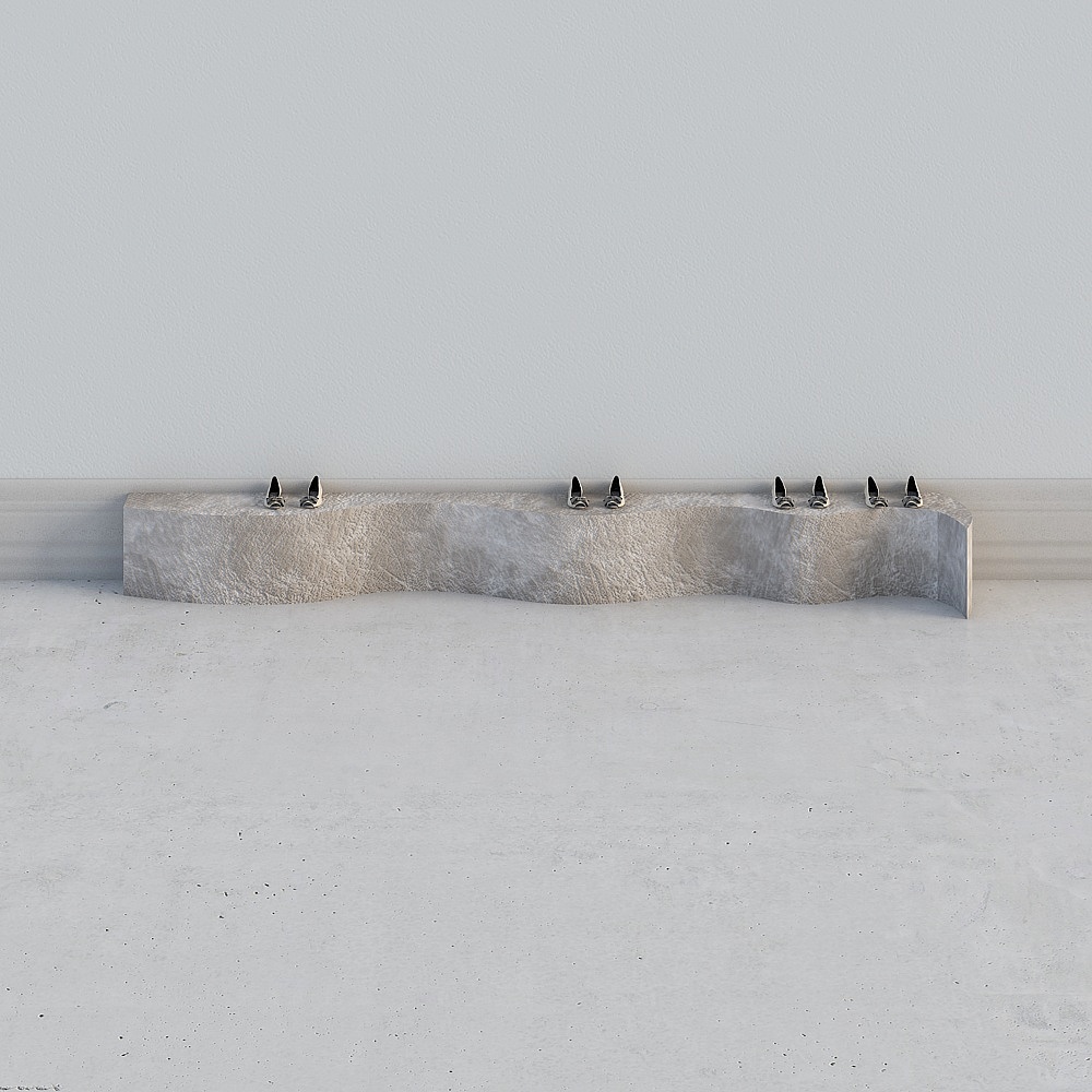 Modern wavy stone bench with textured beige surface and metal legs on grey background