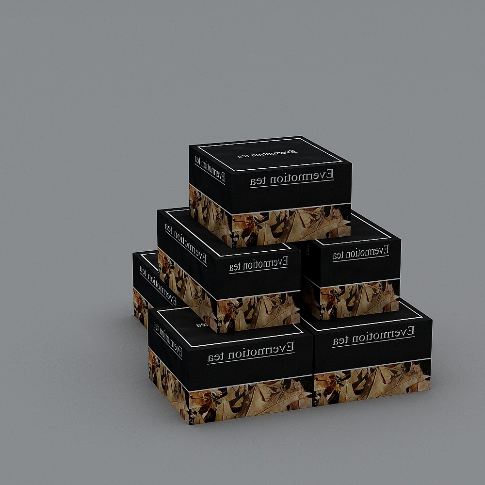 Black tea boxes with brown leaf pattern stacked in pyramid shape on grey background