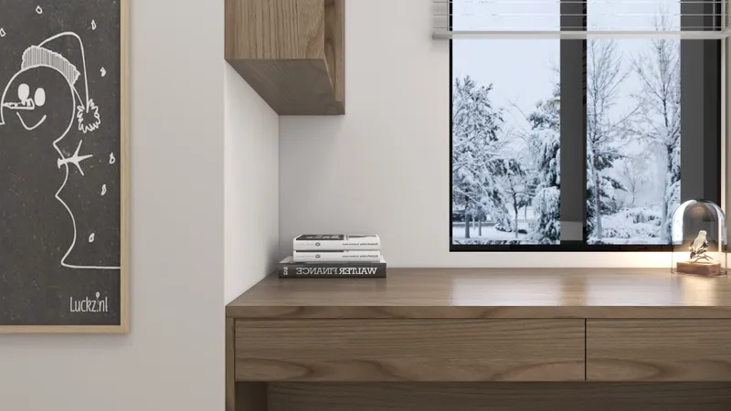 Wooden desk with books and small bird lamp next to window showing snowy winter scene