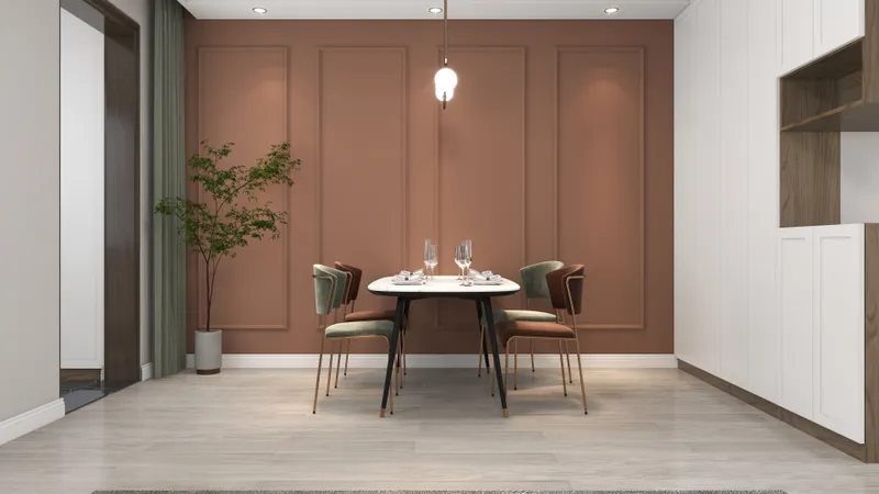 Modern dining room with brown wall panels, marble table, green chairs, white cabinet, ceiling light