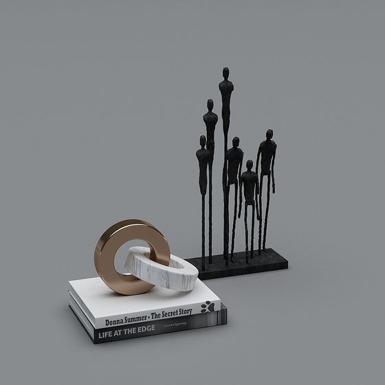 Modern black metal figures and marble rings on books on grey background
