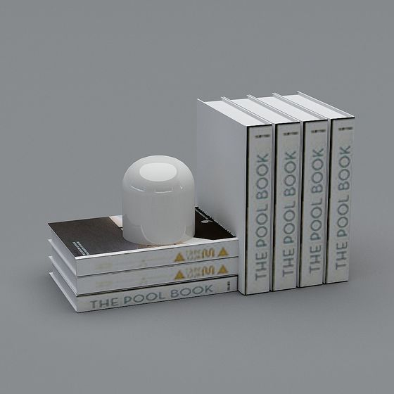 White hardcover books and round white candle on grey background