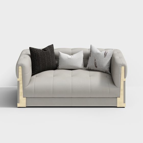 Modern light grey sofa with gold legs and three pillows on white background