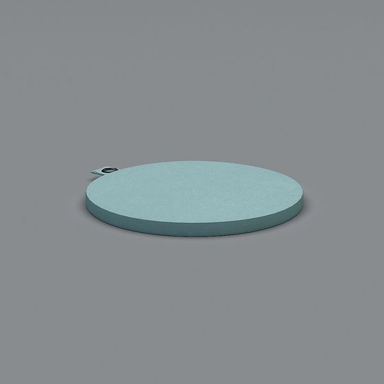 Round light blue stone trivet with small handle loop on grey background