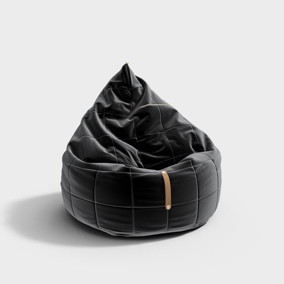 Black quilted leather bean bag chair with gold strap detail on light grey background