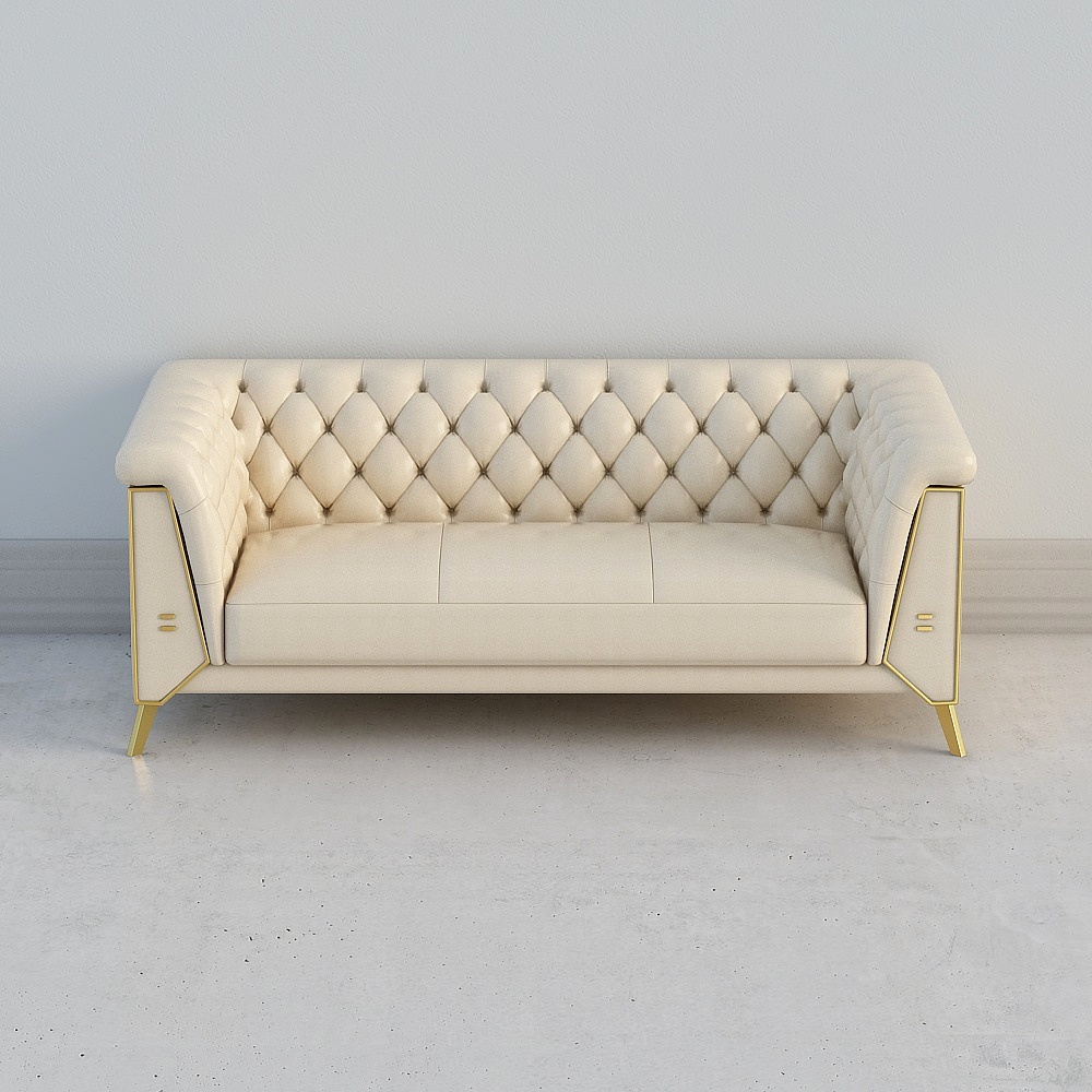 Cream leather tufted sofa with gold metal legs and armrests on grey background