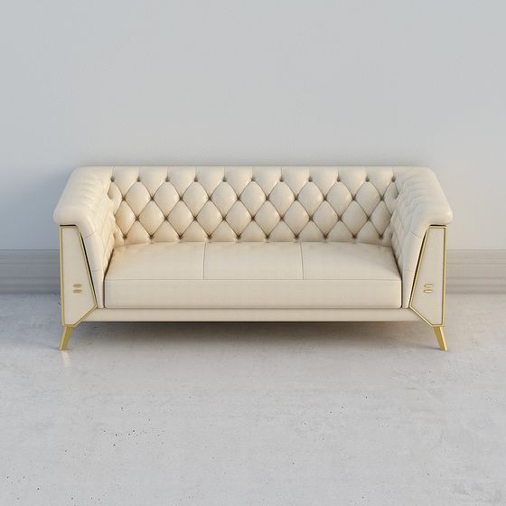 Cream leather tufted sofa with gold metal legs and armrests on grey background