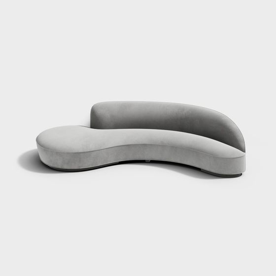 Modern curved grey fabric sofa with low backrest and soft cushions on white background