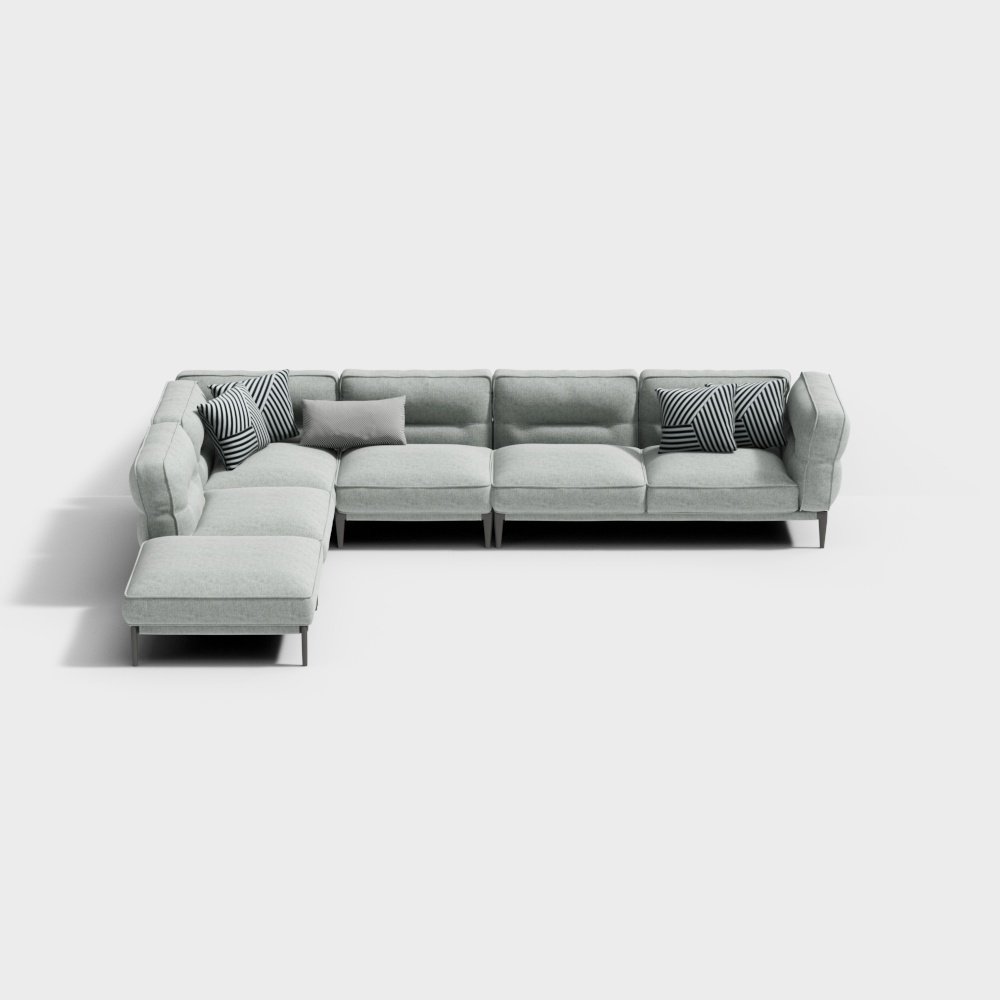 Modern light grey fabric sectional sofa with striped pillows and dark legs on white background