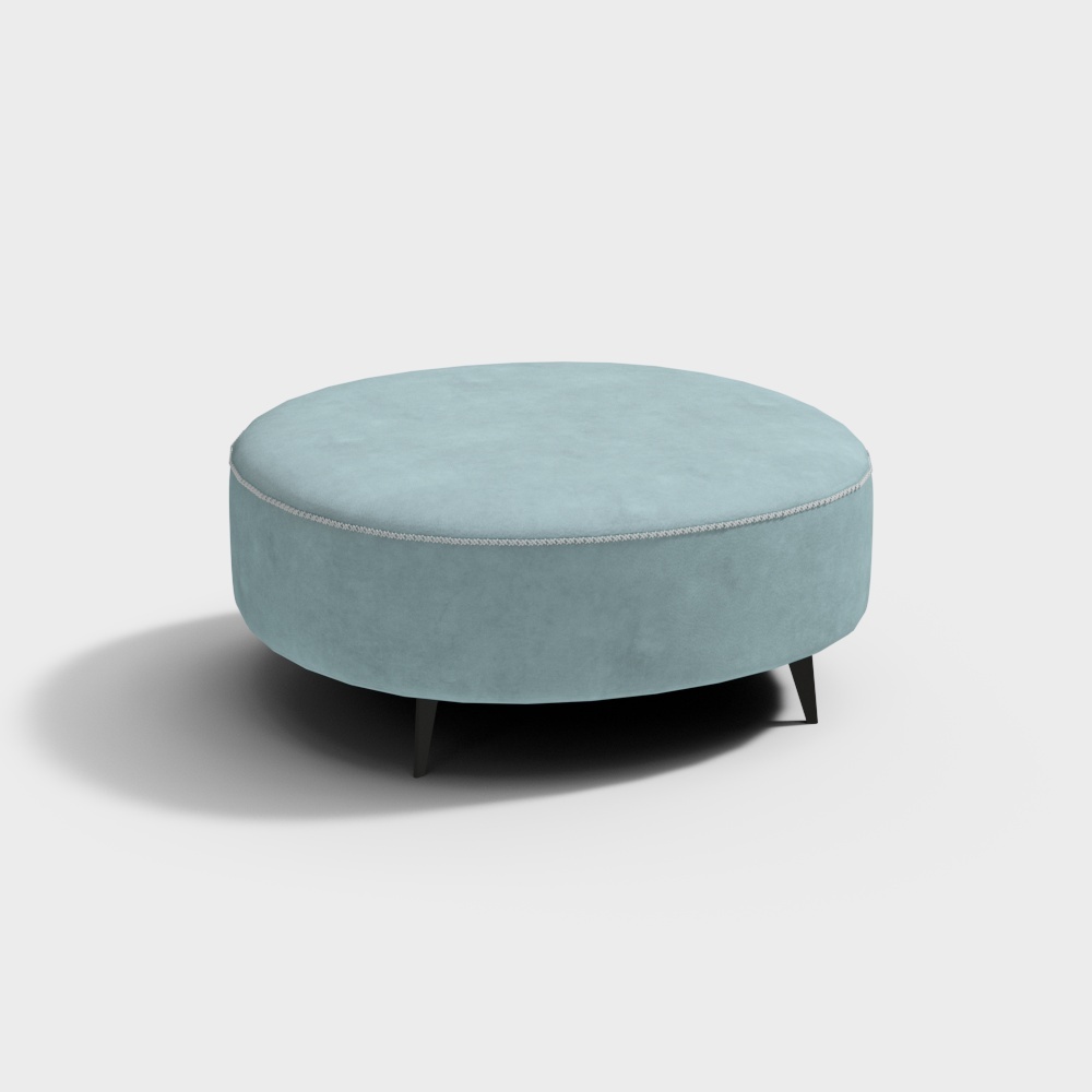 Round light blue fabric footrest with white stitching and black legs on white background