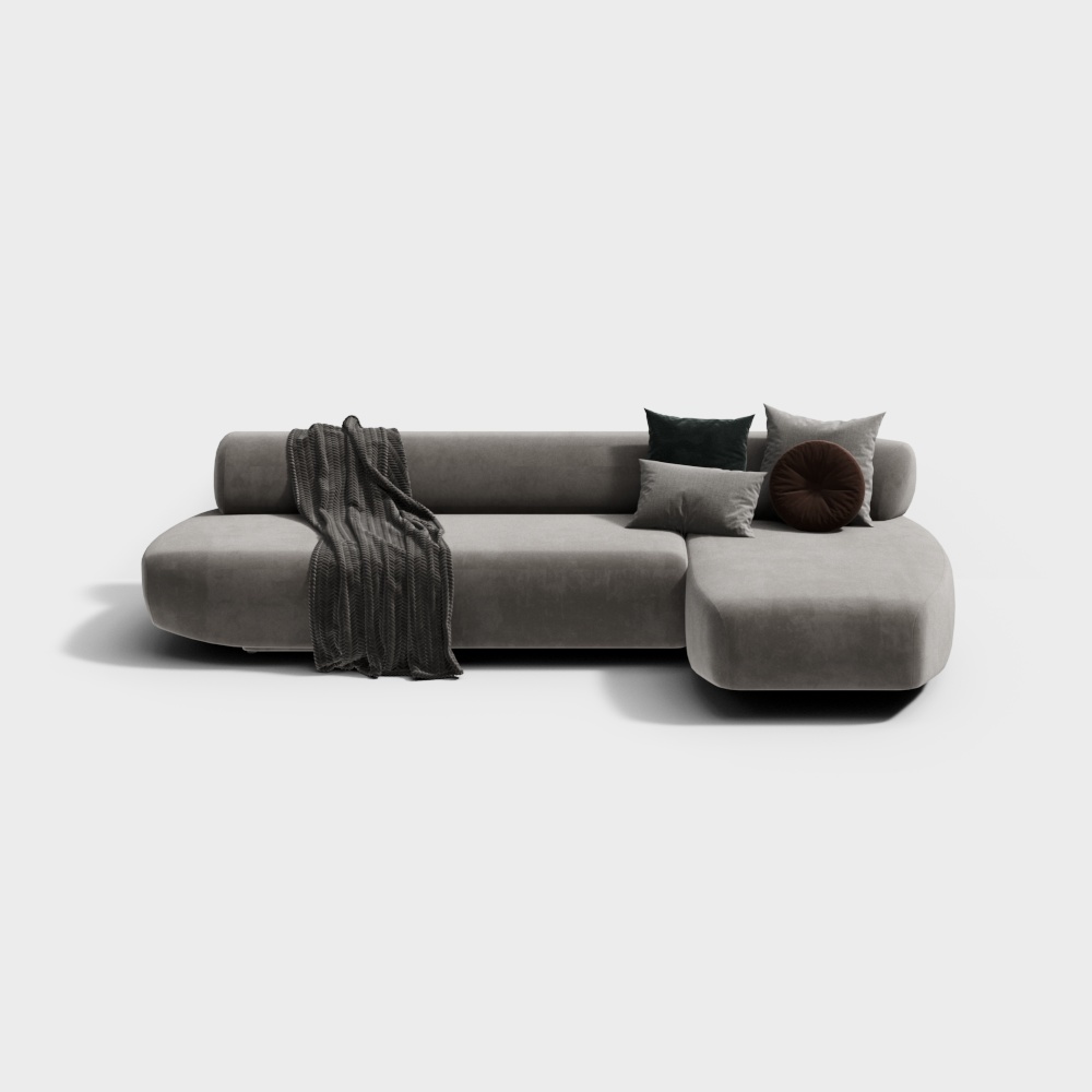 Modern grey sectional sofa with pillows and throw blanket on white background