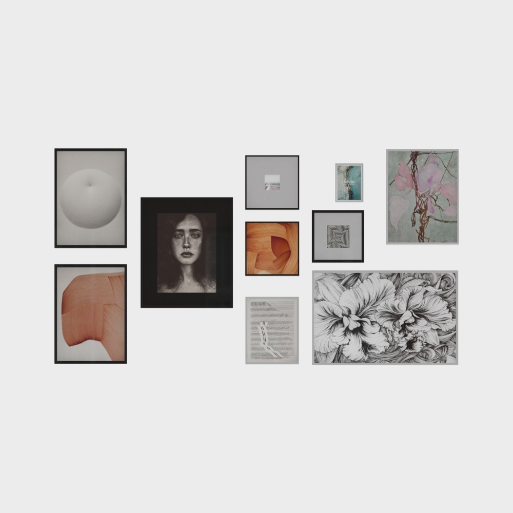 Eclectic gallery wall with black frames and mixed art prints on light grey background