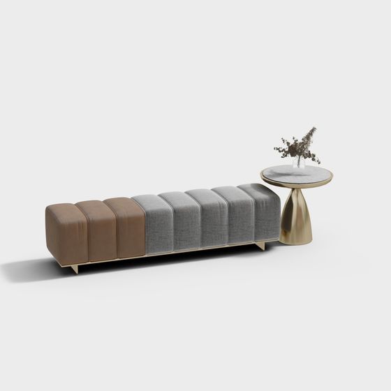 Long brown leather and grey fabric sofa with gold legs and marble table on white background