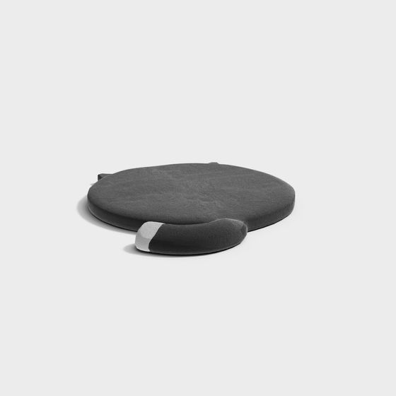 Round dark grey fabric floor cushion with attached armrest on white background