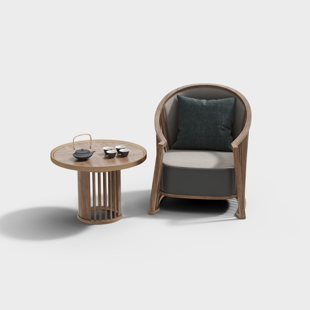 Light wood round table with tea set and grey armchair on white background
