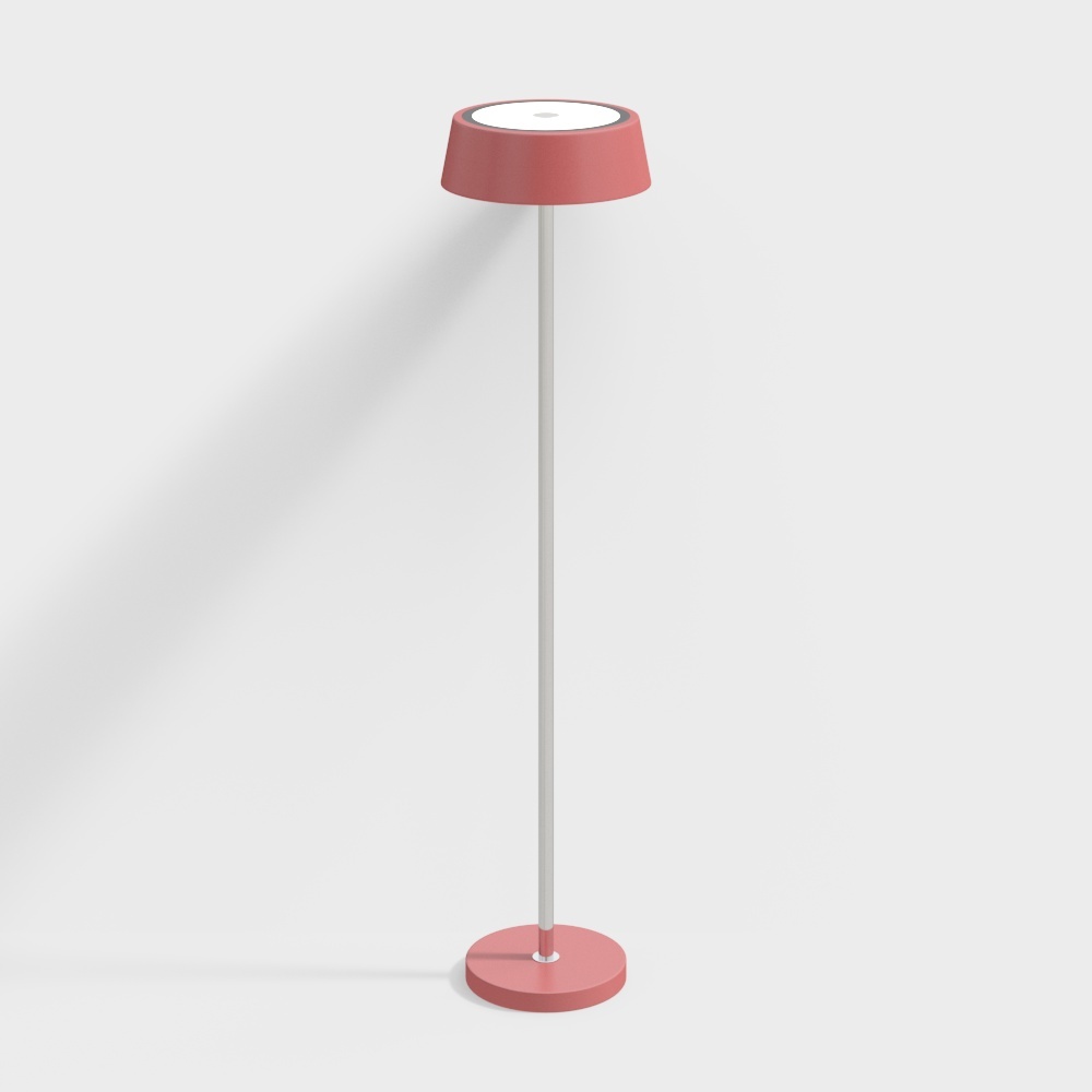 Modern pink floor lamp with white round shade and thin metal pole on grey background