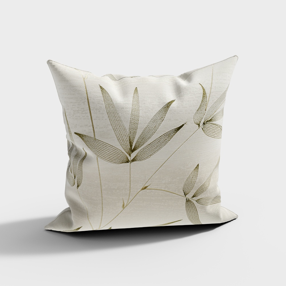 Square white fabric pillow with green bamboo leaf pattern on light grey background
