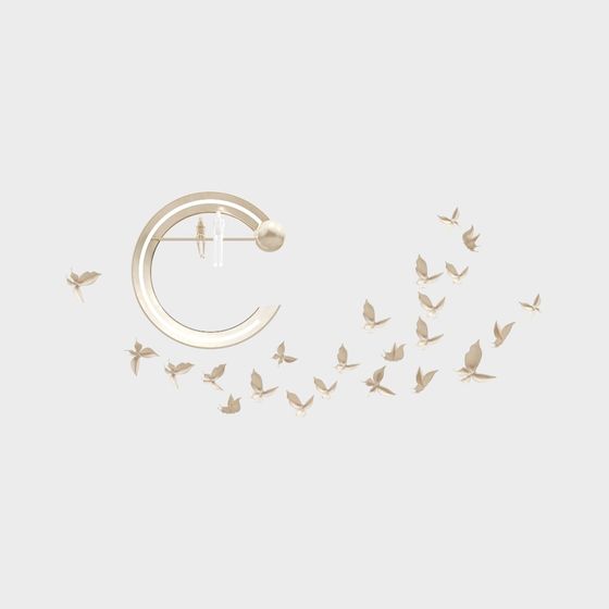 Modern gold ceiling light with ring and butterfly shapes on grey background