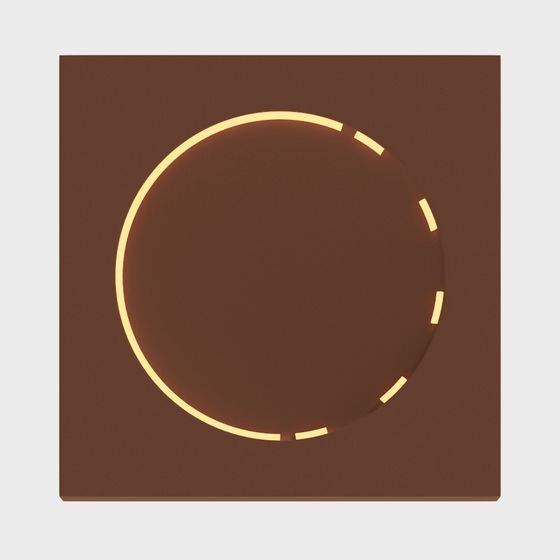 Modern round ceiling light with glowing yellow ring and broken segments on brown background