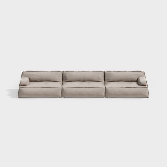 Modern beige modular sofa with three sections and low profile design on white background