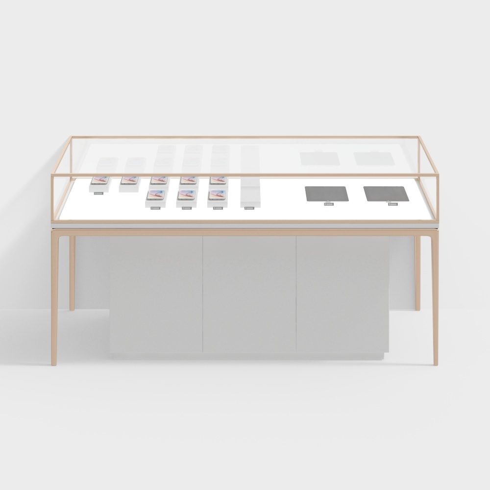 Modern retail display table with glass top and white storage cabinets on grey background