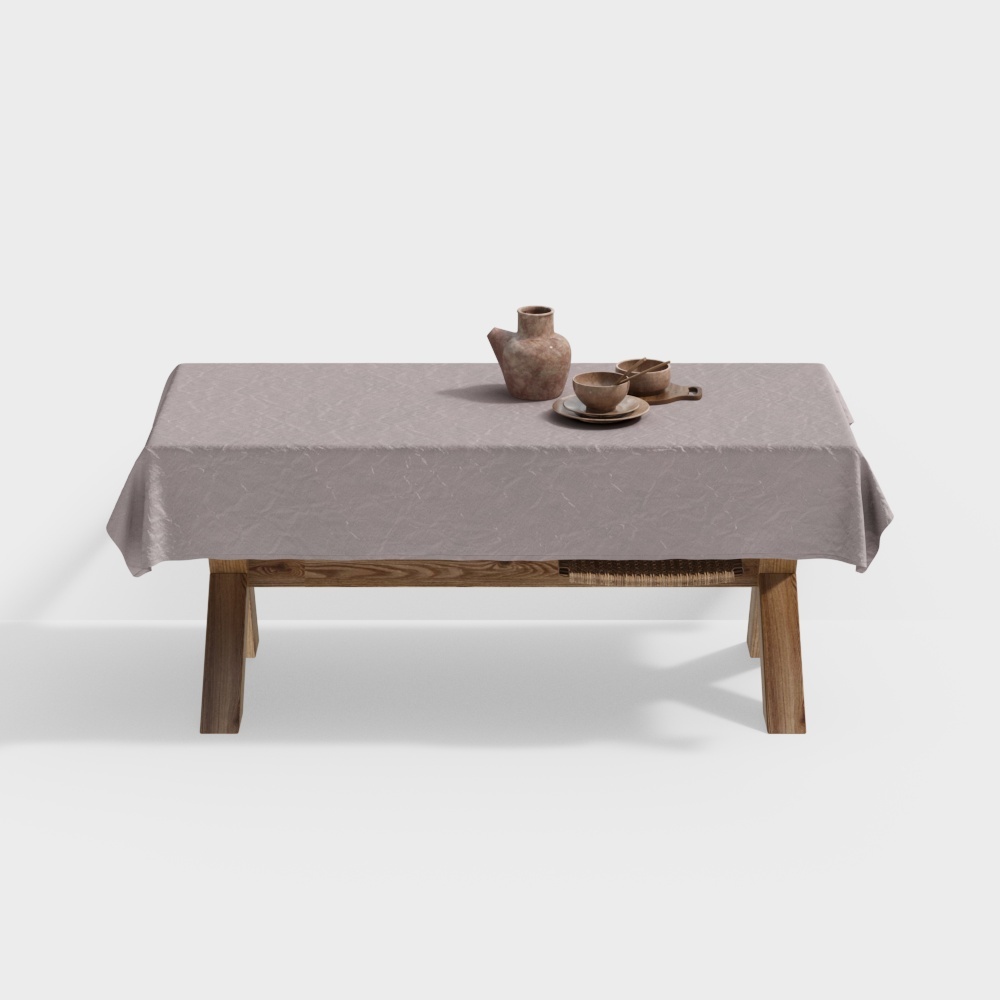 Low wooden coffee table with grey linen cloth and ceramic tea set on white background